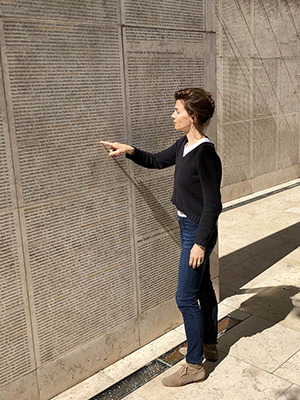 In front of the “mur des noms”, the “Wall of Names”, where Melanie Levensohn is listed.